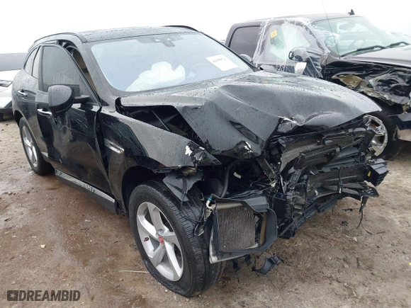 2018 Jaguar F-PACE 25t Premium with VIN SADCJ2FX0JA293960, listed as a IAAI auction lot 41099021 with 76,916 mi miles. Bid and sale history available at carsss.com. Image 1.