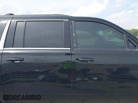 2019 Chevrolet Suburban LS with VIN 1GNSKGKC4KR128685, listed as a IAAI auction lot 42148721 with 92,346 mi miles and . Bid and sale history available at DreamBid. Image 14.