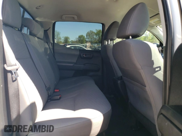2021 Toyota Tacoma SR z VIN 3TYCZ5ANXMT032035, wystawiony jako Copart lot #54517835 z przebiegiem 81 582 mil mil oraz Szkoda całkowita • Salvage title. Historia ofert i sprzedaży dostępna na DreamBid. Obrazek 10.