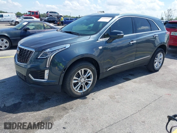 2020 Cadillac XT5 Luxury FWD z VIN 1GYKNAR45LZ224459, wystawiony jako IAAI lot #42295055 z przebiegiem 69 751 mil mil oraz . Historia ofert i sprzedaży dostępna na DreamBid. Obrazek 19.