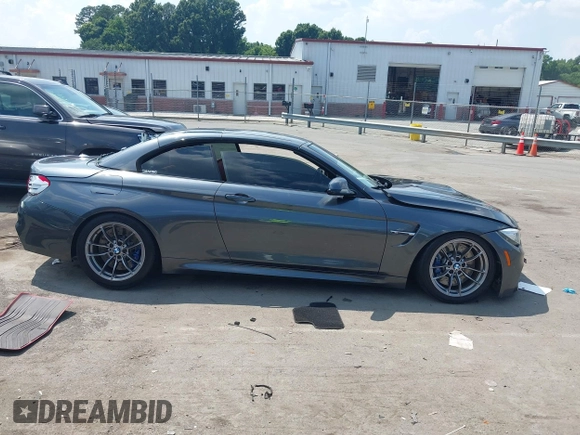 2015 BMW M4 with VIN WBS3U9C5XFJ967725, listed as a IAAI auction lot 42593444 with Not provided miles and . Bid and sale history available at DreamBid. Image 14.