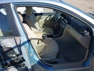 2007 Mazda Mazda3 i Sport with VIN JM1BK12F371683049, listed as a IAAI auction lot 41407019 with 169,716 mi miles. Bid and sale history available at carsss.com. Image 5.