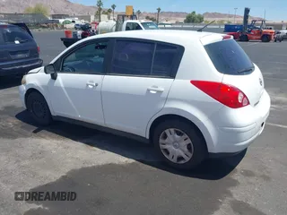 2011 Nissan Versa 1.8 S with VIN 3N1BC1CP0BL452473, listed as a IAAI auction lot 42171311 with 167,018 mi miles. Bid and sale history available at carsss.com. Image 3.