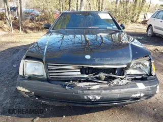1999 Mercedes-Benz SL-Class with VIN WDBFA68F9XF187036, listed as a IAAI auction lot 41542221 with 114,602 mi miles. Bid and sale history available at carsss.com. Image 6.