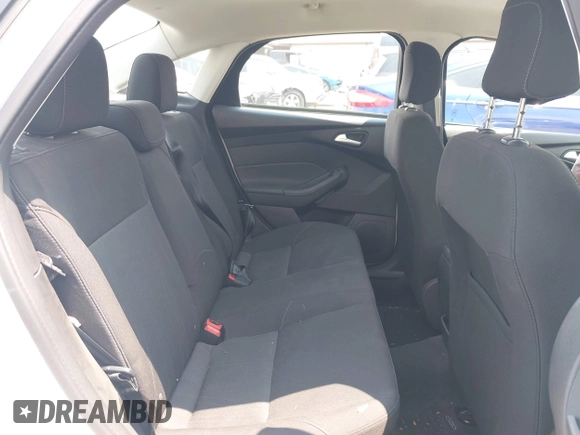 2018 Ford Focus SE z VIN 1FADP3FE5JL267982, wystawiony jako IAAI lot #42646881 z przebiegiem 40 163 mil mil oraz . Historia ofert i sprzedaży dostępna na DreamBid. Obrazek 8.