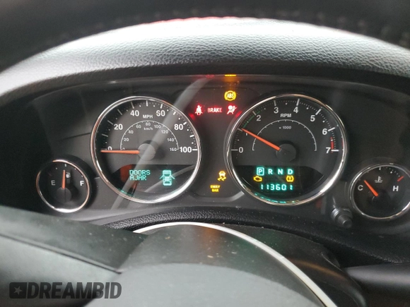 2013 Jeep Wrangler Unlimited Rubicon with VIN 1C4HJWFG6DL565462, listed as a Copart auction lot 51333785 with 113,601 mi miles and Salvage title. Bid and sale history available at DreamBid. Image 9.