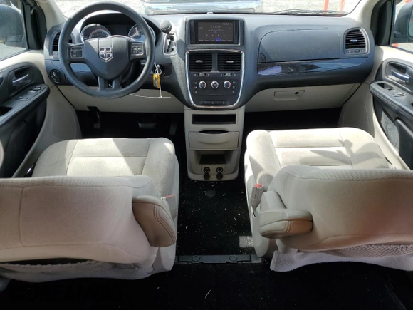 2016 Dodge Grand Caravan SE with VIN 2C4RDGBG9GR169691, listed as a Copart auction lot 53349105 with 93,479 mi miles and Salvage Title. Bid and sale history available at DreamBid. Image 8.