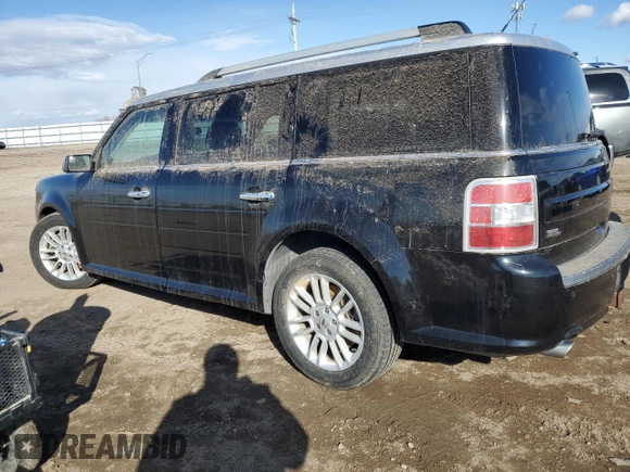 2015 Ford Flex SEL with VIN 2FMHK6C85FBA21138, listed as a Copart auction lot 50011725 with 115,897 mi miles and Salvage Title. Bid and sale history available at carsss.com. Image 2.