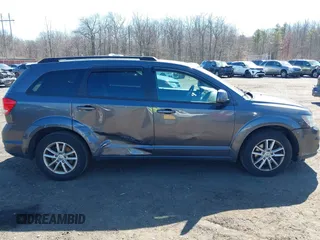 2014 Dodge Journey SXT with VIN 3C4PDCBB2ET156215, listed as a IAAI auction lot 41765840 with 129,737 mi miles and . Bid and sale history available at DreamBid. Image 13.