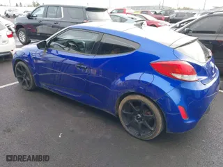2012 Hyundai Veloster w/Black Int with VIN KMHTC6AD5CU027793, listed as a IAAI auction lot 41881333 with 134,984 mi miles. Bid and sale history available at carsss.com. Image 3.