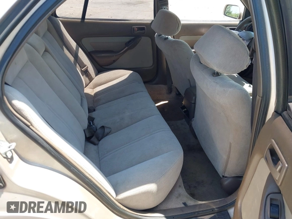 1995 Toyota Camry LE z VIN 4T1SK12E8SU872841, wystawiony jako IAAI lot #42025861 z przebiegiem 228 747 mil mil oraz . Historia ofert i sprzedaży dostępna na DreamBid. Obrazek 8.