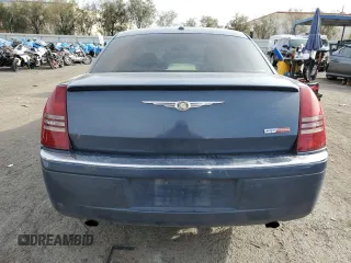 2007 Chrysler 300 C z VIN 2C3KA63H57H790772, wystawiony jako Copart lot #50150225 z przebiegiem 187 800 mil mil oraz Szkoda całkowita • Salvage title. Historia ofert i sprzedaży dostępna na DreamBid. Obrazek 6.