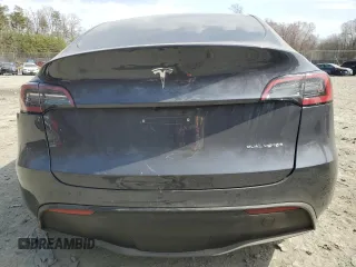 2022 Tesla Model Y Long Range with VIN 7SAYGDEE5NF366493, listed as a Copart auction lot 49874975 with 66,925 mi miles and Salvage Title. Bid and sale history available at DreamBid. Image 6.