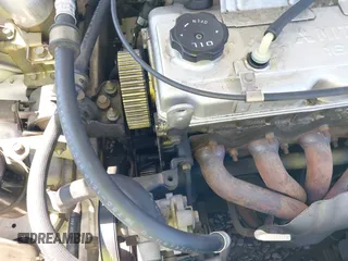 2000 Mitsubishi Mirage DE z VIN JA3AY26C4YU017932, wystawiony jako IAAI lot #42431603 z przebiegiem 193 139 mil mil oraz . Historia ofert i sprzedaży dostępna na DreamBid. Obrazek 12.