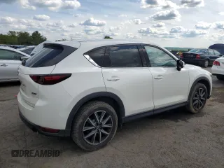 2018 Mazda CX-5 Grand Touring z VIN JM3KFBDM6J0447165, wystawiony jako Copart lot #56133015 z przebiegiem 80 579 mil mil oraz Szkoda całkowita • Salvage title. Historia ofert i sprzedaży dostępna na DreamBid. Obrazek 3.