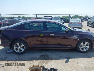 2014 Kia Optima LX with VIN 5XXGM4A70EG273483, listed as a IAAI auction lot 42402765 with 129,770 mi miles and . Bid and sale history available at DreamBid. Image 13.