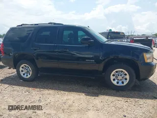 2012 Chevrolet Tahoe LS z VIN 1GNSCAE0XCR201183, wystawiony jako IAAI lot #42456344 z przebiegiem 163 774 mil mil oraz . Historia ofert i sprzedaży dostępna na DreamBid. Obrazek 13.