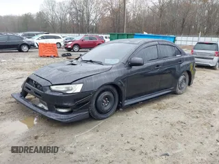 2010 Mitsubishi Lancer Evolution GSR with VIN JA32W8FV1AU012725, listed as a IAAI auction lot 41542629 with 124,347 mi miles and . Bid and sale history available at DreamBid. Image 17.