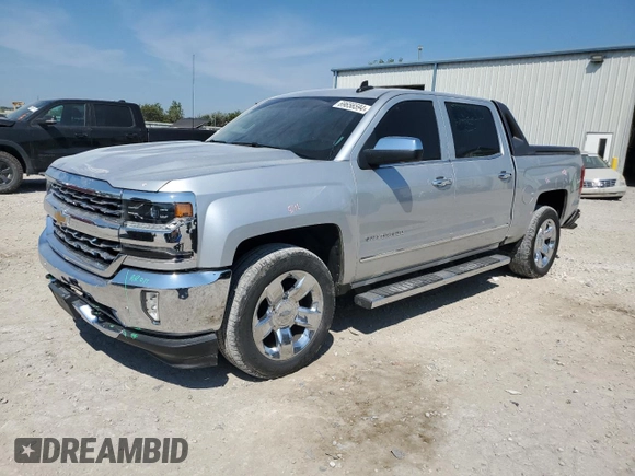 2017 Chevrolet Silverado 1500 LTZ with VIN 3GCPCSEJ5HG402865, listed as a Copart auction lot 69656594 with 121,087 mi miles and Salvage Title. Bid and sale history available at DreamBid. Image 1.