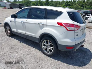 2013 Ford Escape SEL z VIN 1FMCU0H94DUD22476, wystawiony jako IAAI lot #42673808 z przebiegiem 215 811 mil mil oraz . Historia ofert i sprzedaży dostępna na DreamBid. Obrazek 3.