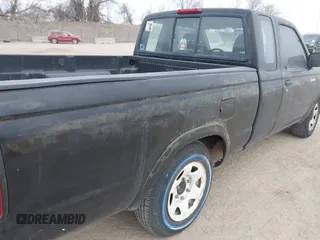 1998 Nissan Frontier XE z VIN 1N6DD26S2WC325599, wystawiony jako IAAI lot #41551614 z przebiegiem 99 047 mil mil oraz . Historia ofert i sprzedaży dostępna na DreamBid. Obrazek 13.