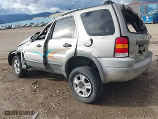 2001 Ford Escape XLT with VIN 1FMCU04151KB58369, listed as a IAAI auction lot 40711508 with 1 mi miles. Bid and sale history available at carsss.com. Image 3.