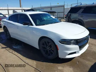 2020 Dodge Charger SXT with VIN 2C3CDXBG9LH136457, listed as a IAAI auction lot 41585590 with 61,390 mi miles. Bid and sale history available at carsss.com. Image 1.