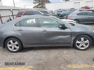 2009 Acura TSX z VIN JH4CU26609C006240, wystawiony jako IAAI lot #41721575 z przebiegiem 172 916 mil mil oraz . Historia ofert i sprzedaży dostępna na DreamBid. Obrazek 13.