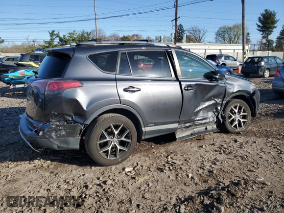 2018 Toyota RAV4 Hybrid SE with VIN JTMJJREV5JD210274, listed as a Copart auction lot 52450645 with 108,249 mi miles and Salvage title. Bid and sale history available at DreamBid. Image 3.