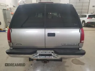 1999 Chevrolet Suburban z VIN 3GNFK16R4XG250550, wystawiony jako Copart lot #51941515 z przebiegiem 202 667 mil mil oraz Szkoda całkowita • Salvage title. Historia ofert i sprzedaży dostępna na DreamBid. Obrazek 6.