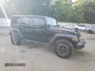 2016 Jeep Wrangler Unlimited Rubicon with VIN 1C4HJWFG9GL220687, listed as a Copart auction lot 60552705 with 49,525 mi miles and Salvage title. Bid and sale history available at DreamBid. Image 4.