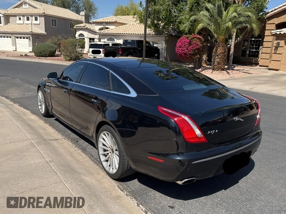 2012 Jaguar XJ with VIN SAJWA2GBXCLV24464, listed as a Copart auction lot 52572955 with 135,087 mi miles and Clean Title. Bid and sale history available at carsss.com. Image 3.