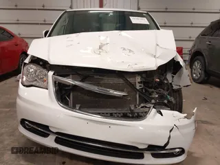 2016 Chrysler Town & Country Touring with VIN 2C4RC1BG1GR185657, listed as a IAAI auction lot 41905462 with 167,142 mi miles and . Bid and sale history available at DreamBid. Image 13.
