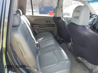 2005 Honda Pilot EX-L with RES with VIN 5FNYF18605B055105, listed as a IAAI auction lot 41534204 with 388,106 mi miles. Bid and sale history available at carsss.com. Image 8.
