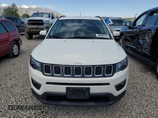 2021 Jeep Compass Latitude z VIN 3C4NJDBB5MT560792, wystawiony jako Copart lot #56300155 z przebiegiem 89 783 mil mil oraz Szkoda całkowita • Salvage title. Historia ofert i sprzedaży dostępna na DreamBid. Obrazek 5.