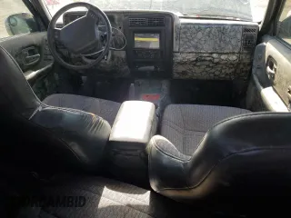 1999 Jeep Cherokee Sport with VIN 1J4FF68S6XL645028, listed as a Copart auction lot 48897255 with 218,552 mi miles and Salvage Title. Bid and sale history available at carsss.com. Image 8.