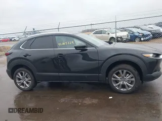 2025 Mazda CX-30 S Carbon Edition z VIN 3MVDMBCM9SM783429, wystawiony jako IAAI lot #42065729 z przebiegiem 4 940 mil mil oraz . Historia ofert i sprzedaży dostępna na DreamBid. Obrazek 13.