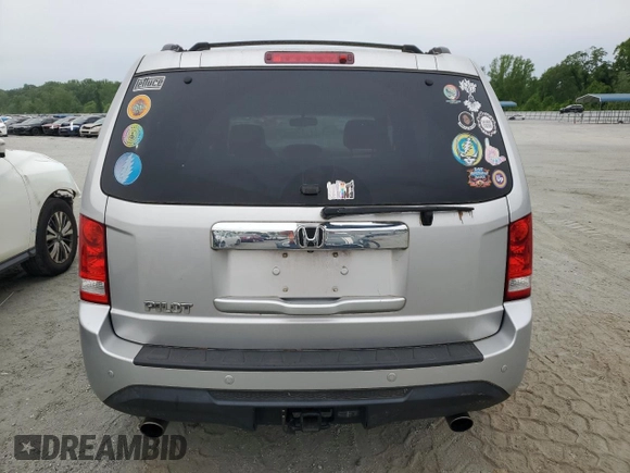 2015 Honda Pilot EX-L z VIN 5FNYF3H54FB002573, wystawiony jako Copart lot #56209955 z przebiegiem 184 046 mil mil oraz Czysty tytuł • Clean title. Historia ofert i sprzedaży dostępna na DreamBid. Obrazek 6.