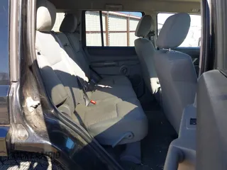 2006 Jeep Commander with VIN 1J8HG48N66C174256, listed as a IAAI auction lot 41652107 with 106,966 mi miles. Bid and sale history available at carsss.com. Image 8.