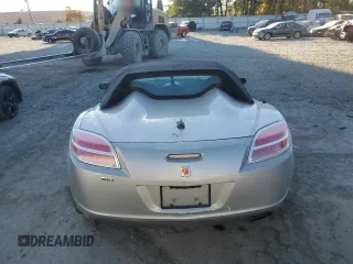 2007 Saturn Sky z VIN 1G8MB35B57Y124617, wystawiony jako Copart lot #76162604 z przebiegiem 140 003 mil mil oraz Szkody całkowita. Historia ofert i sprzedaży dostępna na DreamBid. Obrazek 6.