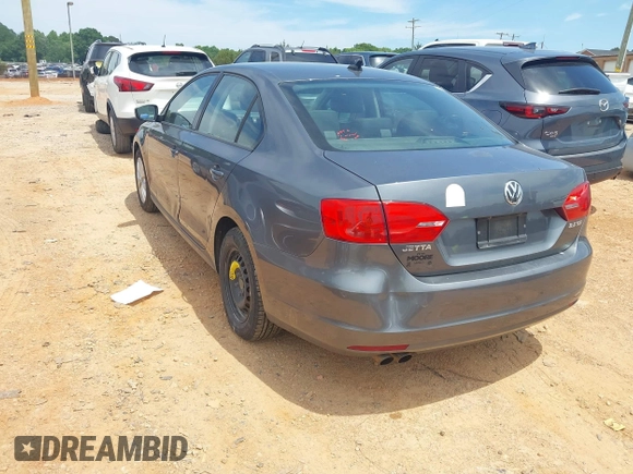 2011 Volkswagen Jetta SE with VIN 3VWDX7AJ4BM330203, listed as a IAAI auction lot 42256889 with 209,557 mi miles and . Bid and sale history available at DreamBid. Image 3.