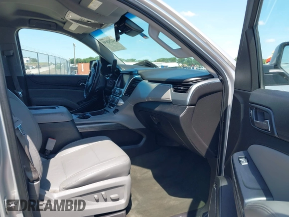2015 Chevrolet Tahoe LT with VIN 1GNSCBKC9FR223426, listed as a IAAI auction lot 42352698 with 128,339 mi miles and . Bid and sale history available at DreamBid. Image 5.