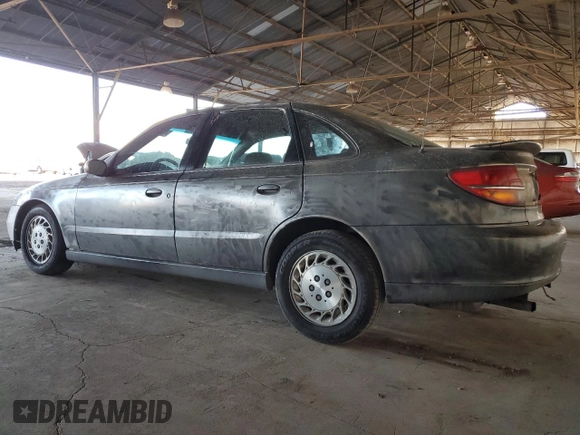 2002 Saturn LS z VIN 1G8JS54F72Y593493, wystawiony jako Copart lot #46571815 z przebiegiem 167 673 mil mil oraz Szkody całkowita. Historia ofert i sprzedaży dostępna na DreamBid. Obrazek 2.