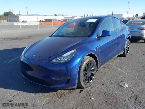 2023 Tesla Model Y Long Range with VIN 7SAYGDEE4PA035856, listed as a IAAI auction lot 41408305 with 59,344 mi miles. Bid and sale history available at carsss.com. Image 2.