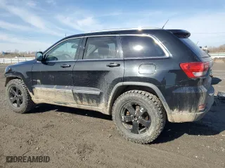 2011 Jeep Grand Cherokee Laredo with VIN 1J4RR4GG4BC624399, listed as a Copart auction lot 52796525 with 242,317 mi miles and Clean Title. Bid and sale history available at carsss.com. Image 2.
