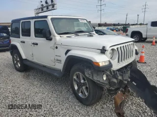 2019 Jeep Wrangler Unlimited Sahara с VIN 1C4HJXEG6KW580031, выставлен на аукционе Copart как лот 59687835 с пробегом 136 590 миль миль и Списание • Salvage title. История ставок и продаж доступна на DreamBid. Изображение 4.