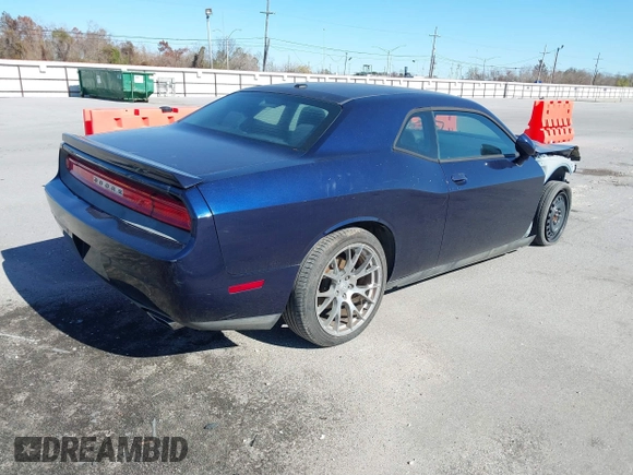 2013 Dodge Challenger R/T z VIN 2C3CDYBT7DH679522, wystawiony jako IAAI lot #41387221 z przebiegiem 122 147 mil mil oraz . Historia ofert i sprzedaży dostępna na DreamBid. Obrazek 4.