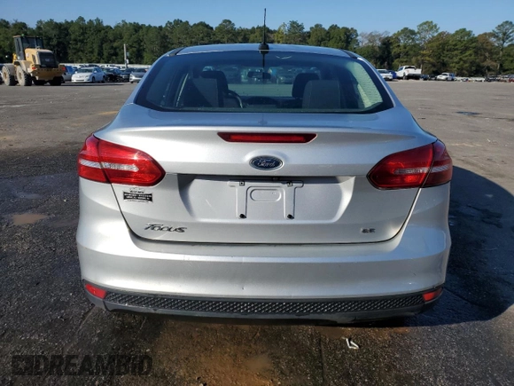 2017 Ford Focus SE with VIN 1FADP3F28HL315779, listed as a Copart auction lot 82608154 with 143,902 mi miles and Salvage title. Bid and sale history available at DreamBid. Image 6.