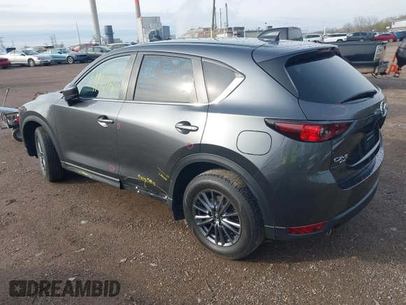 2020 Mazda CX-5 Touring with VIN JM3KFBCM8L0863951, listed as a IAAI auction lot 41921635 with 88,629 mi miles. Bid and sale history available at carsss.com. Image 3.