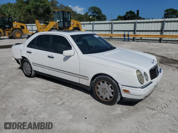1997 Mercedes-Benz E-Class with VIN WDBJF55F2VJ024815, listed as a Copart auction lot 75228024 with 184,398 mi miles and Non Repairable. Bid and sale history available at carsss.com. Image 4.